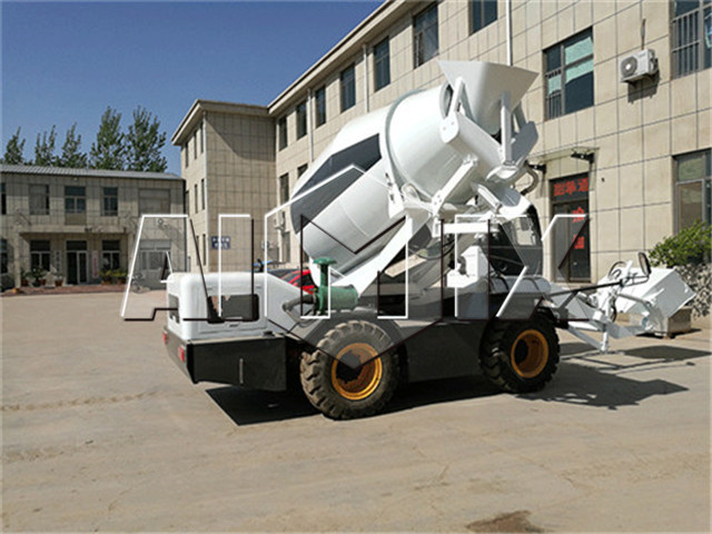 Self loading concrete mixer machine